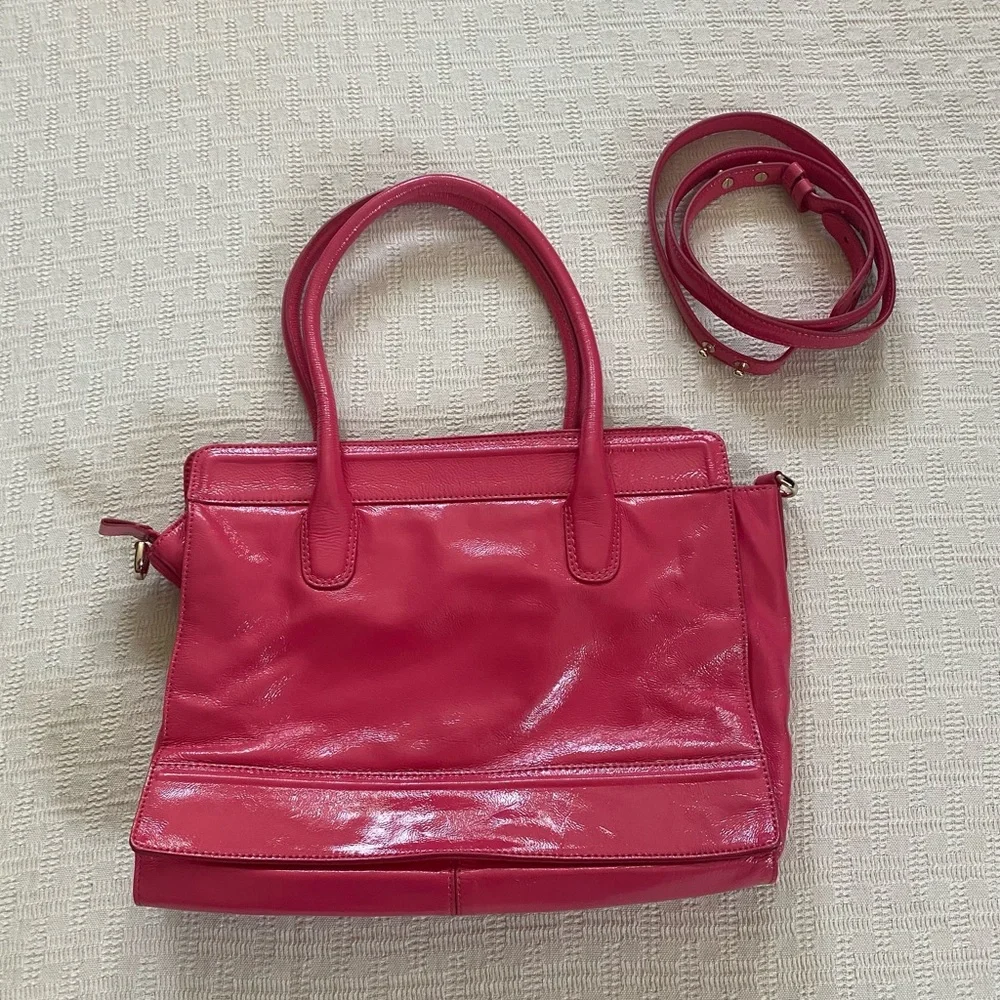 Cole Haan pink patent leather purse.